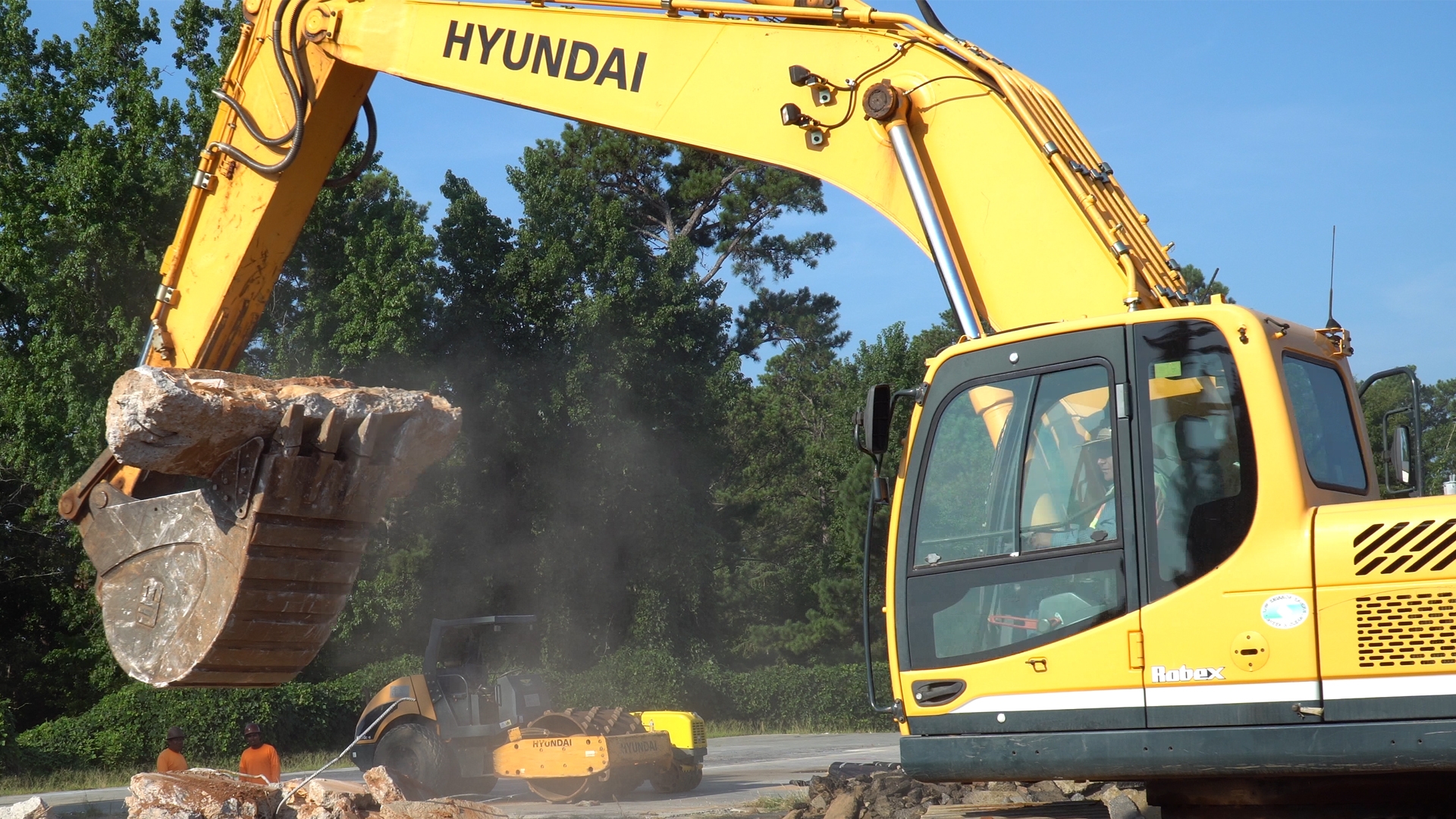 hyundai-330lc-9a-excavator-carrying-concrete-slab