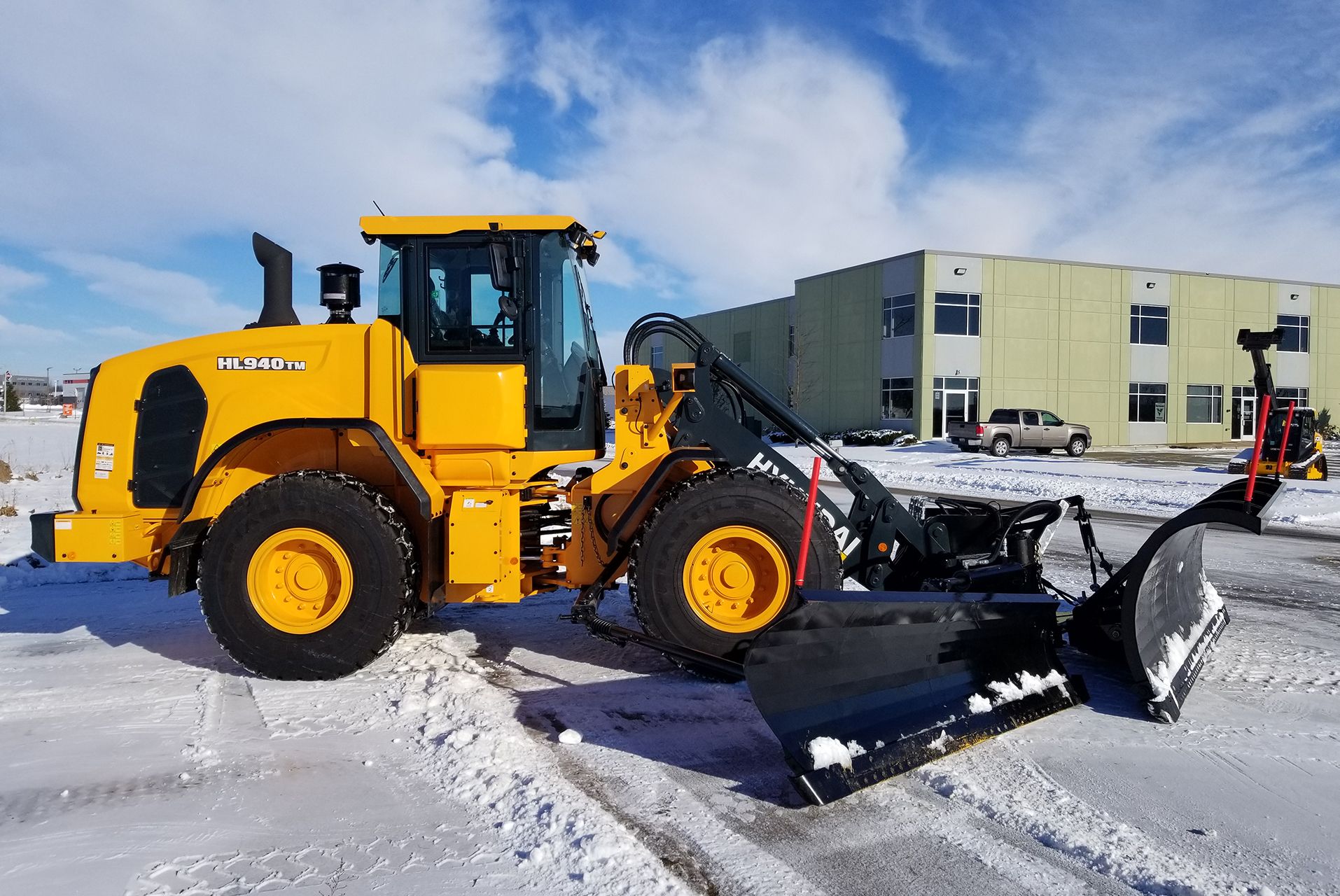 HL940TM Wheel Loader With Burke-Yes Equipment Wing & Snow Plow Set Up